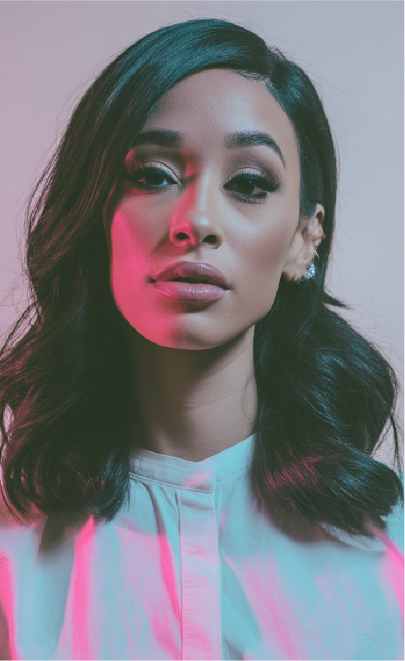 Nicola with magenta and teal lighting.